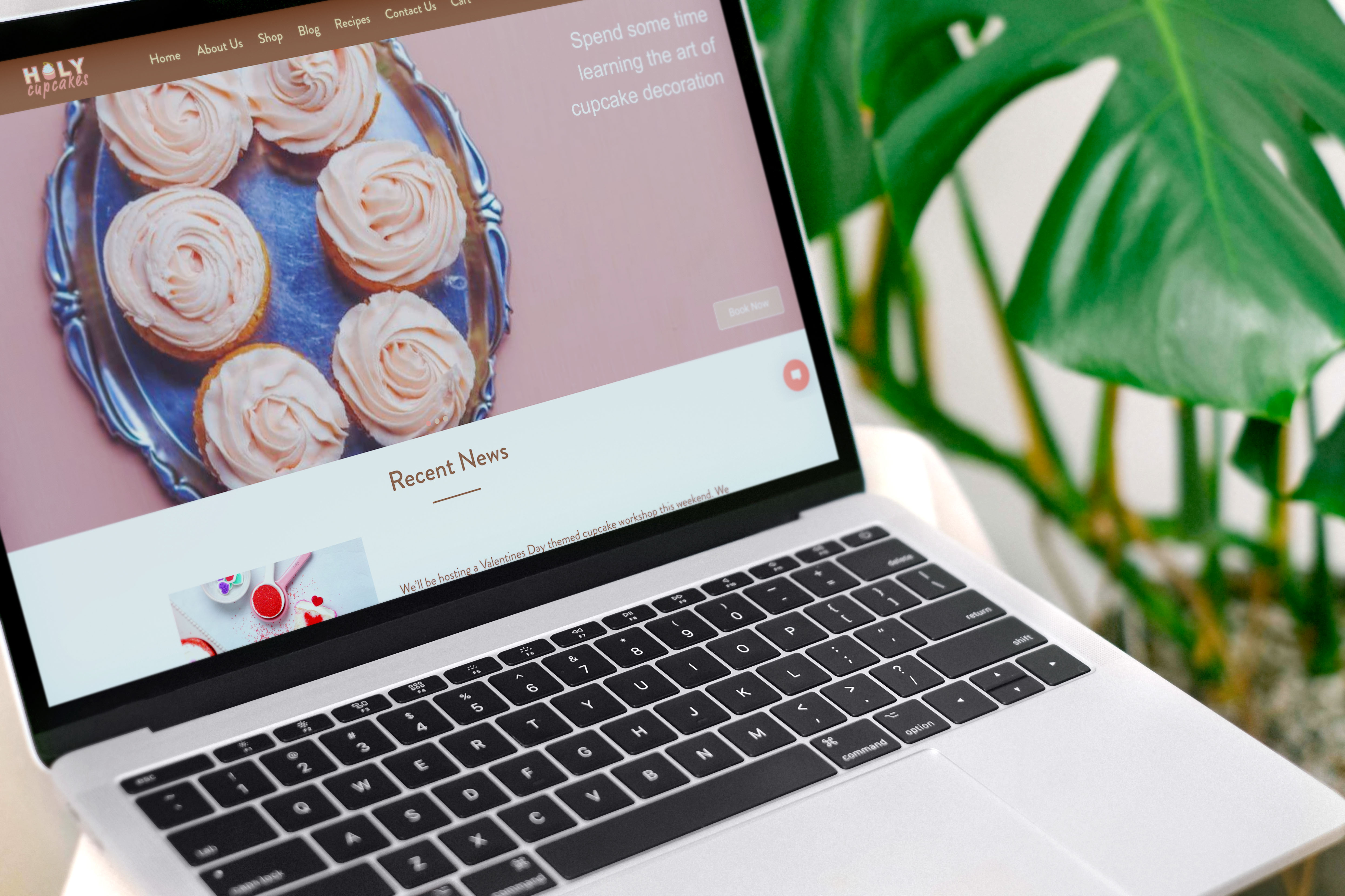 Mock up of Holy Cupcake website on front view of laptop